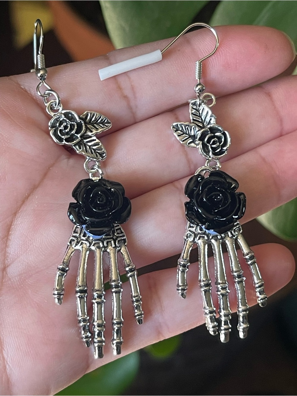 Silver Skeleton Hand Earrings with Black Rose Accent
